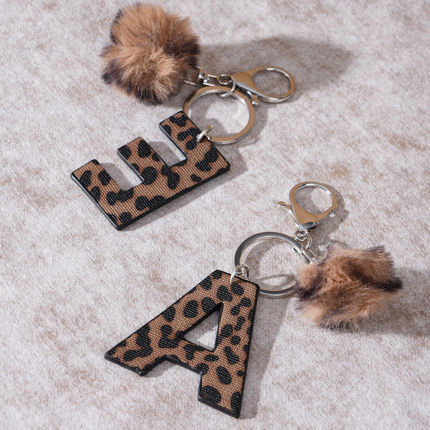 Leopard Print Vegan Leather Letter Keychain with Faux Fur Pom