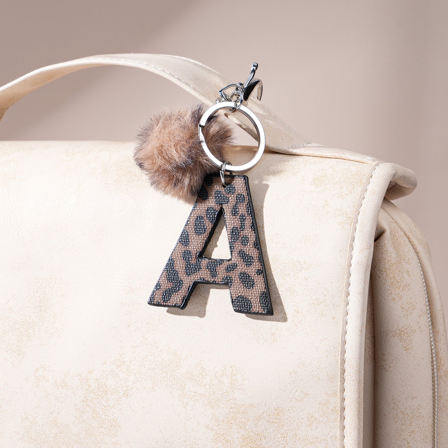 Leopard Print Vegan Leather Letter Keychain with Faux Fur Pom