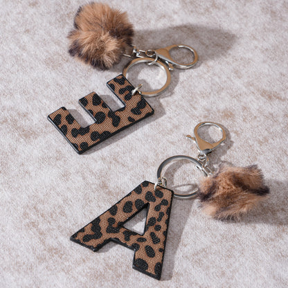 Leopard Print Vegan Leather Letter Keychain with Faux Fur Pom