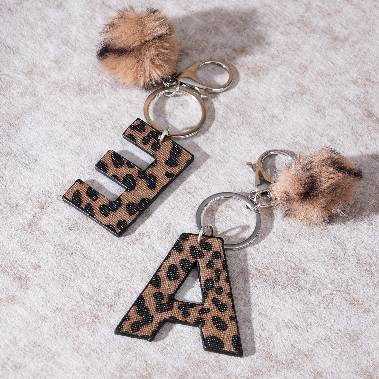 Leopard Print Vegan Leather Letter Keychain with Faux Fur Pom