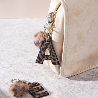 Leopard Print Vegan Leather Letter Keychain with Faux Fur Pom