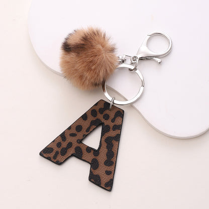 Leopard Print Vegan Leather Letter Keychain with Faux Fur Pom