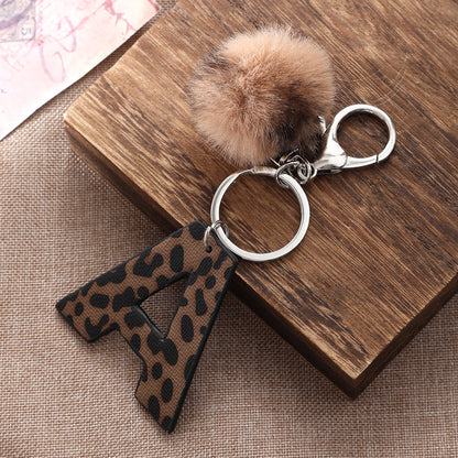 Leopard Print Vegan Leather Letter Keychain with Faux Fur Pom